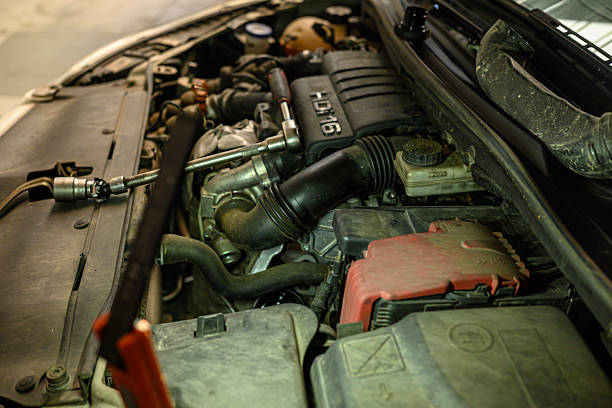 istock close up of vehicle engine components in a workshop automobile engine maintenance with tools visible 2216736857