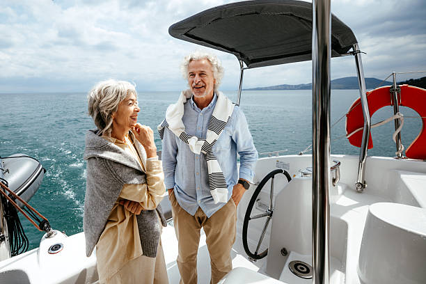 istock Senior couple enjoying a quiet conversation on yacht 2216739634