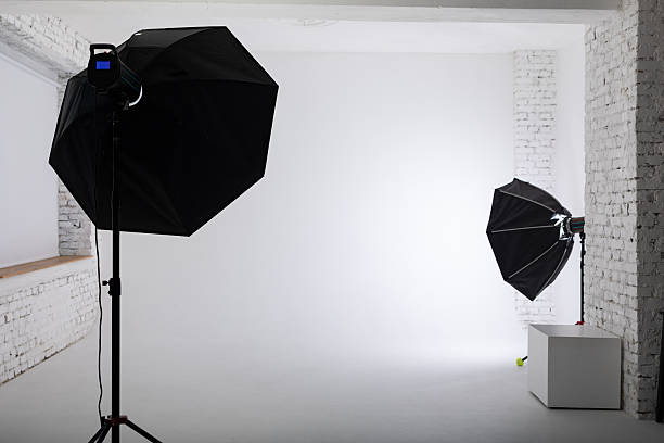 istock Clear white cyclorama. Light background with with professional lighting equipment. Plain wall empty photo studio. 2216749453