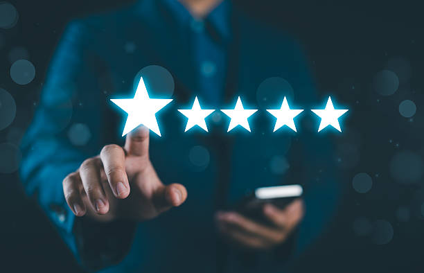 istock Man give rating to service excellent experience on mobile phone application, Customer review satisfaction feedback survey concept. Client evaluate quality of service, reputation ranking of business. 2216755205