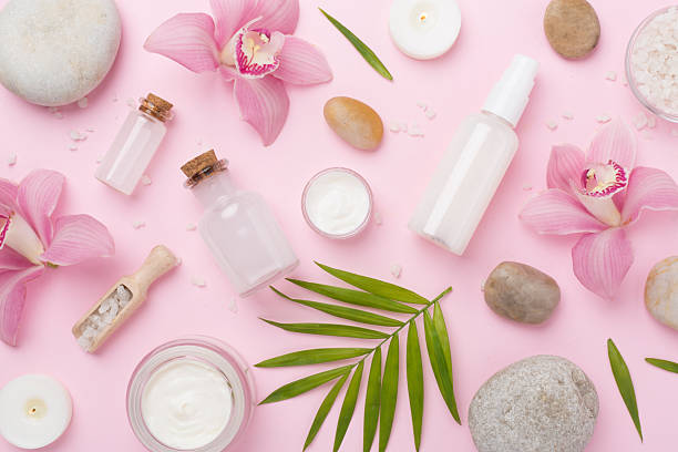 istock Composition with orchids, spa products on color background, top view 2216755611