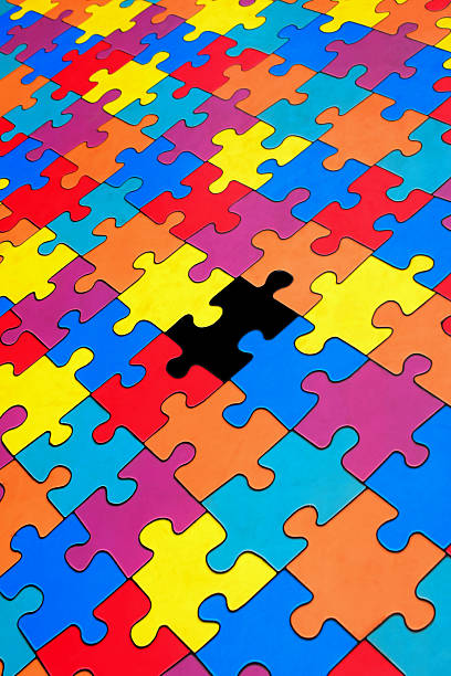 istock Missing piece in colorful jigsaw puzzle – concept of incompleteness or solution needed 2216758964