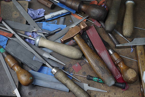 istock Collection of tools, including hammers, pliers, and scissors 2216778676