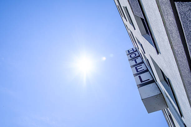 Sofia, Bulgaria. May 23, 2024. A close-up shot of the Grand Hotel Bulgaria sign in Sofia, Bulgaria, with a stunning sunset sky behind it. The buildings modern architecture and large glass windows are also visible in the image.