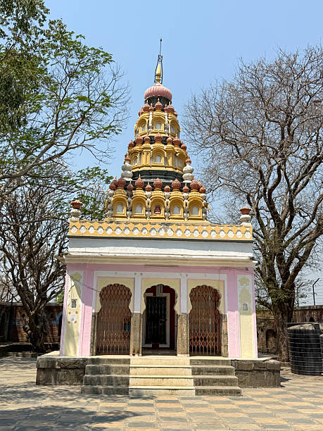 istock A small building with a pink and white color scheme 2216781695