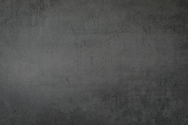 istock Decorative shabby dark-grey plastered wall, art background, copy space. 2216783940
