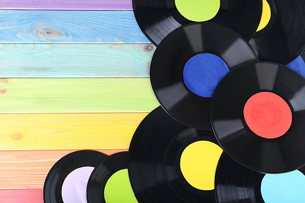 istock Vinyl records on colourful wooden table 2216789379