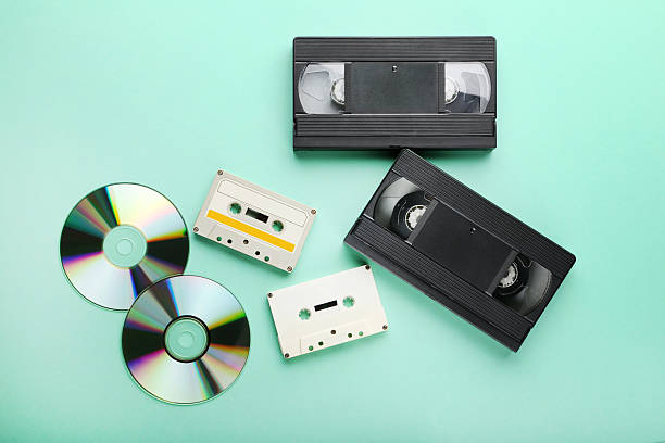 istock Video and music cassette tapes with CD disk on mint background 2216789804