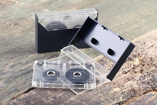 istock Cassette tapes on the wooden table 2216789842