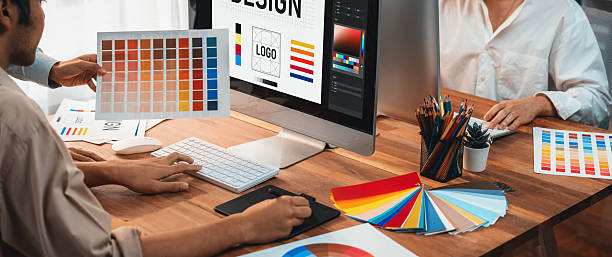 istock Graphic designer works on computer laptop with digital pen. Scrutinize 2216790820