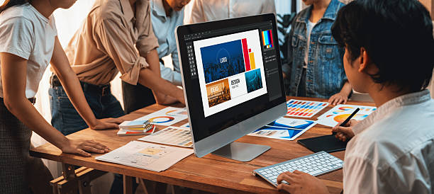 istock Graphic designer works on computer laptop with digital pen. Scrutinize 2216791011