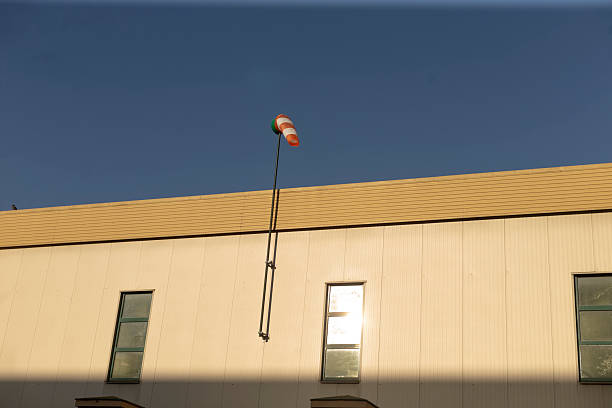 Close-up of an airfield windsock in low winds.