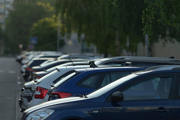 istock Parked Cars in Urban Environment During Bright Daylight Hours 2216792553