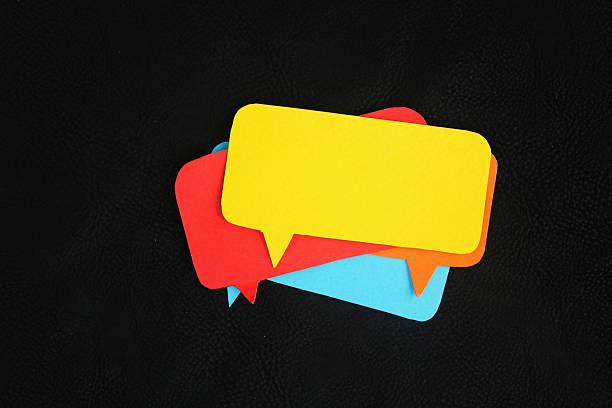 istock Group of colored paper conversation shapes. Speech Bubble shape. concept of conversation, issue or dialogue 2216793488
