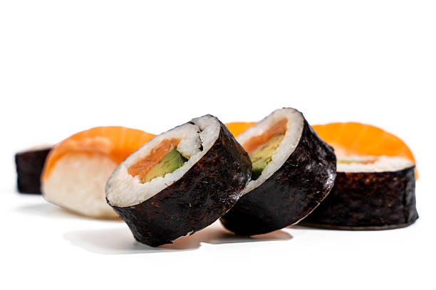 istock Close-up of sushi rolls with avocado. 2216795700
