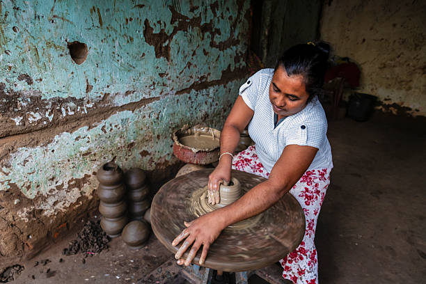 istock Lankan potter working in a workshop near Sigiriya town 2216796064