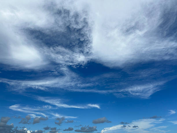 istock Beautiful, dynamic cloud formations in a clear blue sky at midday 2216797862
