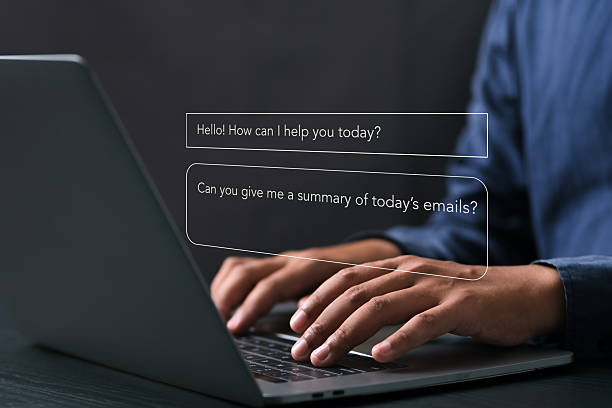 A conceptual image illustrating human-AI interaction in a digital workspace, emphasizing business transformation, cloud communication, and virtual productivity within modern enterprise environments. A conceptual image illustrating human-AI interaction in a digital workspace, emphasizing business transformation, cloud communication, and virtual productivity within modern enterprise environments. process automation office stock pictures, royalty-free photos & images