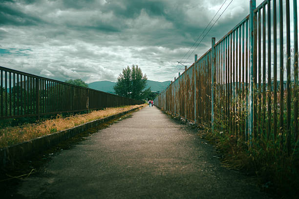 istock Two girls on the sidewalk going to school 2216802440
