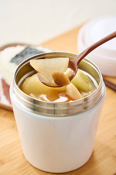 Bento-style miso soup and rice ball served with lunch jar