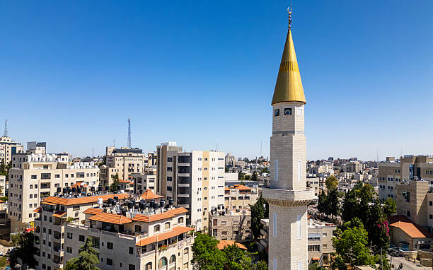 istock A golden clad minaret in downtown Ramallah with a deep blue sky 2216805773
