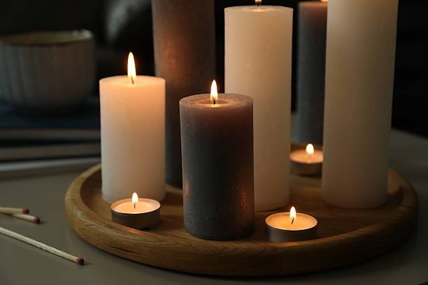 istock Beautiful burning candles and matches on table indoors, closeup 2216806660