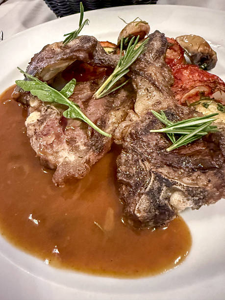istock Grilled lamb cutlets in gravy 2216813024