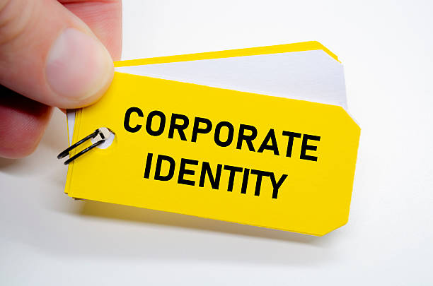 istock Corporate identity design idea highlighted on yellow sticky note for visual and verbal alignment. 2216813153