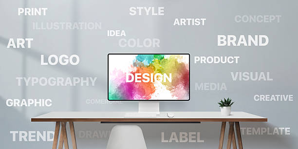 istock Inspiring workspace with digital display showing colorful design message, emphasizing full spectrum of modern creative disciplines 2216817051