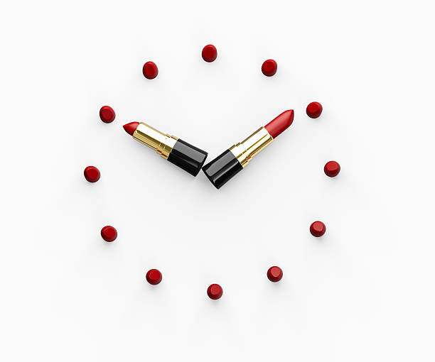 istock 3d Creative Clock Design Made Of Red Lipsticks 10:10 ten Time White Background 3d Illustration 2216819920