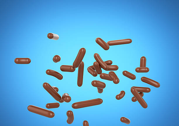 istock Chocolate Sprinkles For Cakes, Ice Cream And Desserts Falling On Blue Background 3D Illustration 2216820073