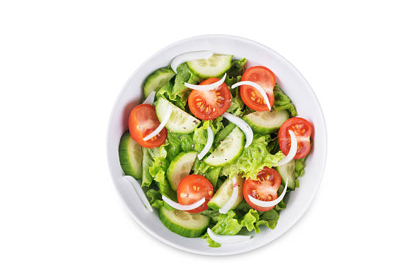 istock Tomato onion cucumber salad in a bowl on a white isolated background 2216820809