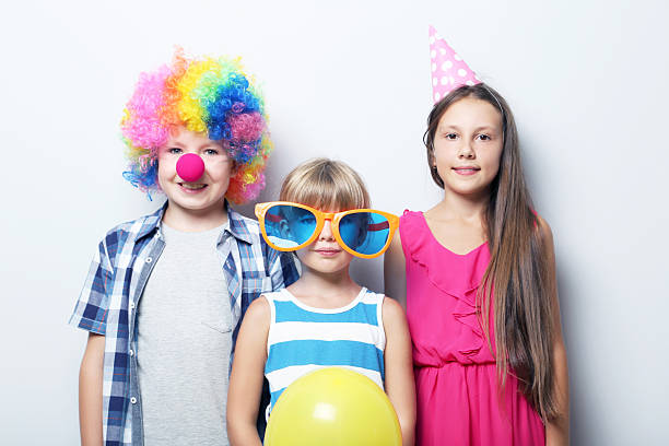 Portrait of childrens on grey background