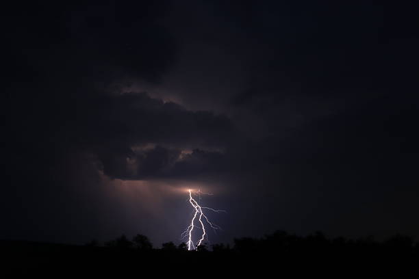 Storm, lightning in the black sky