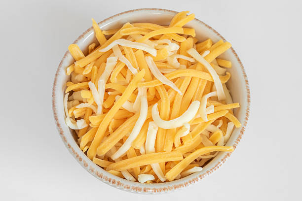 istock Shredded Cheddar and Colby Jack Cheeses in a Bowl 2216827722