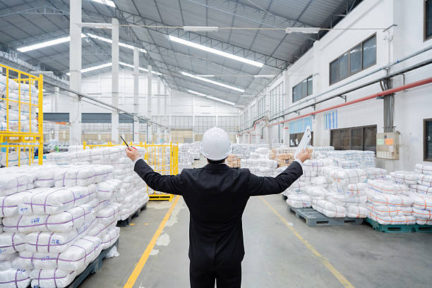 istock The male engineer implemented predictive maintenance software across the industrial plant's machinery to minimize downtime in operations involving plastic and steel production. 2216828925