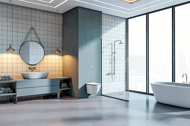 istock Modern luxury bathroom interior with panoramic city view, featuring shower, bathtub, vanity, and tiled walls in elegant contemporary design. 3D Rendering 2216829415