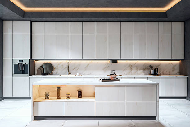 istock Modern minimalist kitchen interior with marble countertops and ambient lighting in contemporary architectural style. 3D Rendering 2216829524