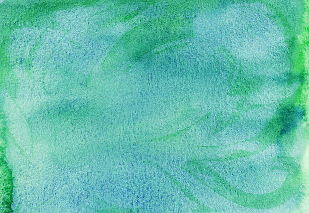 Abstract background art created with blue and green watercolors on paper