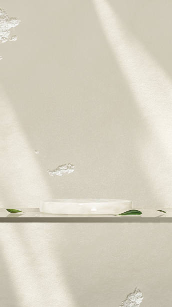 istock A product display scene featuring clear glass elements, set against a concrete background with sunlight streaming in. 2216834512