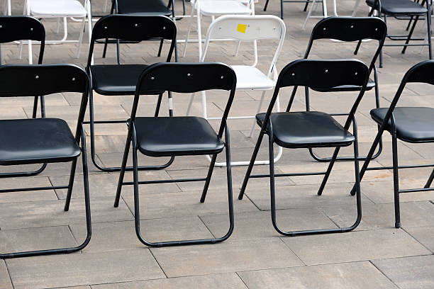 Lots of chairs in a row.