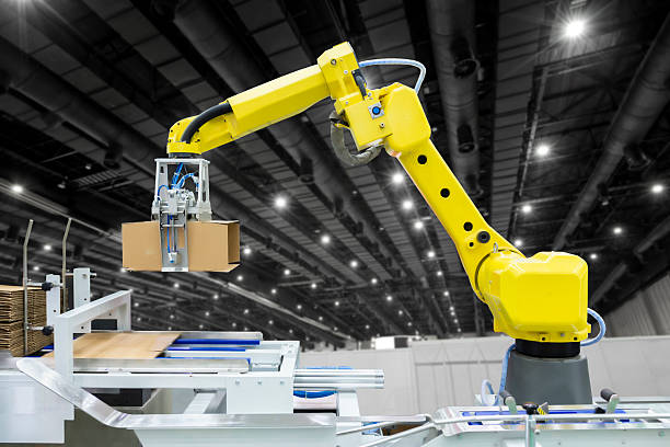istock Controller of industrial robotic arm for performing, dispensing, material-handling and packaging applications in production line manufacturer factory. 2216837259