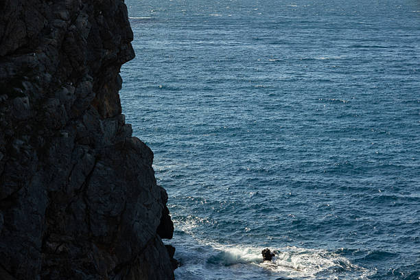 istock Backlit cliff in the Mediterranean Sea 2216843620