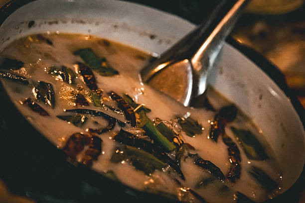 Vibrant Thai Coconut Galangal Soup (Tom Kha Gai) in a Hot Pot