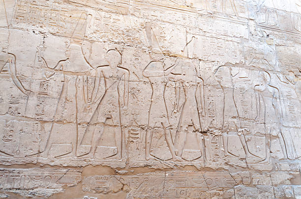 Views of ancient Egyptian architecture and hieroglyphs at historic sites in Luxor, showcasing temples, statues, columns, and intricate carvings.