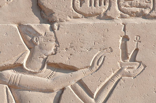 Old egyptian hieroglyphic carvings.