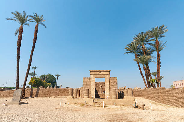 Views of ancient Egyptian architecture and hieroglyphs at historic sites in Luxor, showcasing temples, statues, columns, and intricate carvings.