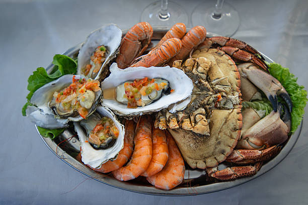 istock Delicious Fresh Seafood Platter with Oysters Crabs and Prawns. 2216853957