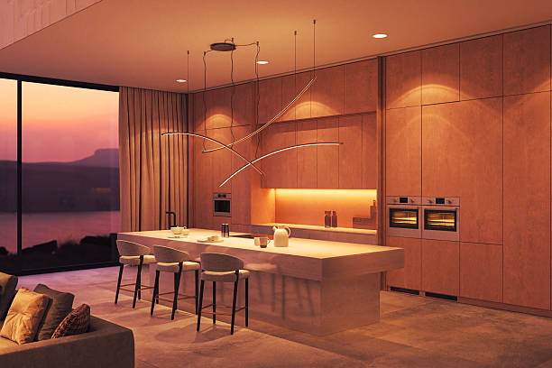 istock Minimalist luxury kitchen with sunset view and sculptural lighting 2216858411