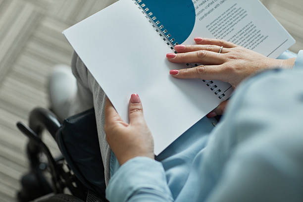 Person with Disability Reading Booklet